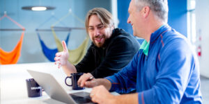 orases employees collaborating on a project