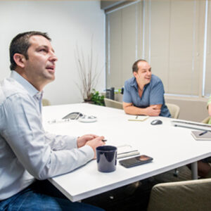 orases case study nflf sprint review meeting with two employees