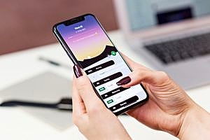 a smartphone that is being used to research what app development is