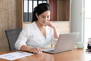 Client looking through an app portfolio of a mobile application developer