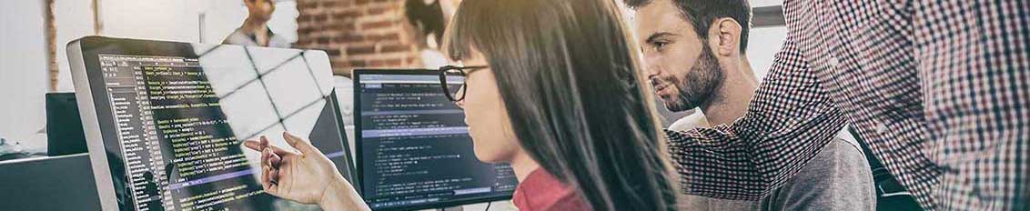 Custom software development team working on SaaS software