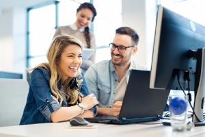 Group of software developers during the final phase of custom software development process