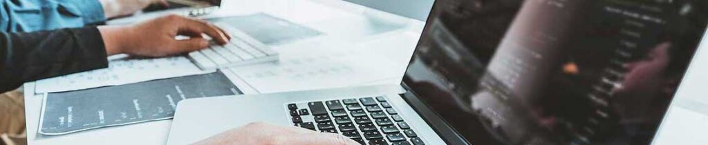 Software developers creating custom software