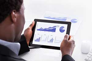 business owner using a modernized application developed by a custom software company