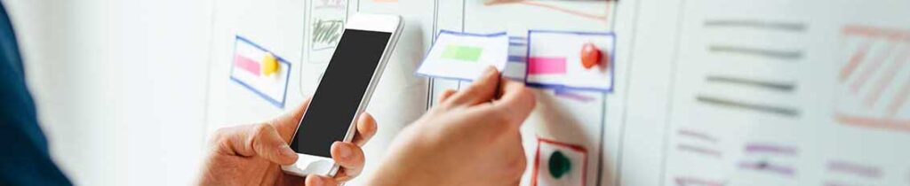 Mobile application developer working on new mobile app