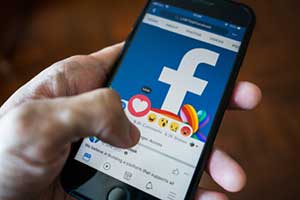 Man on the Facebook app