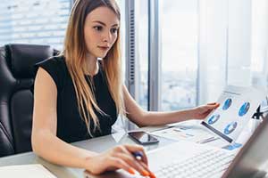 Business analyst reviewing numbers
