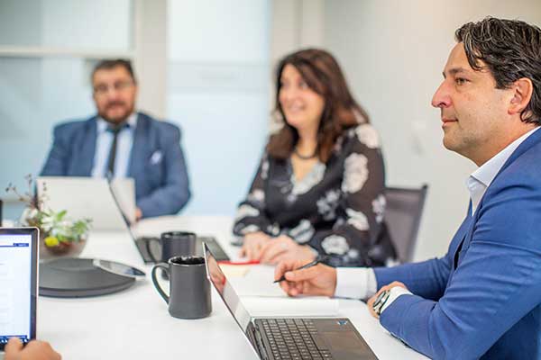 Orases management discussing Synergy project