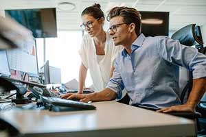 Woman speaking with a custom ERP software developer