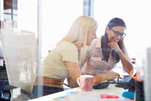 Business owners looking at a SaaS business model