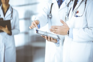 group of doctors using their Custom Patient Portal