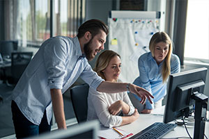 Team of IT staff working on project