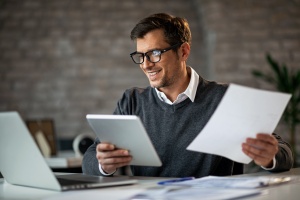 man working on his Custom Web Portal 