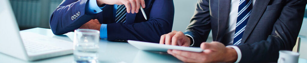 two business owners considering IT staff augmentation for their organization