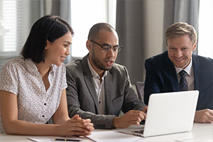 database migration company employee discussing migration to client