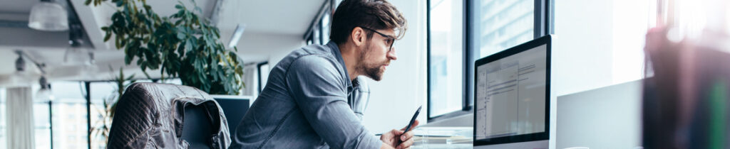Man reviewing his ADA website compliance for 2022