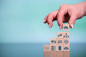 concept of saas with icons on wooden cubes
