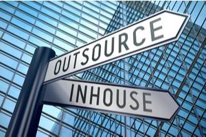 Street signboard showing directions outsource and inhouse