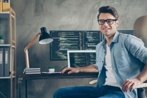 developer working on nearshore development services in office