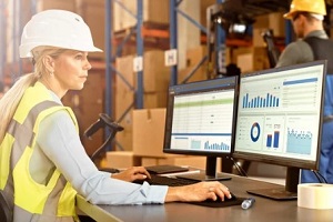 inventory worker working on computer software