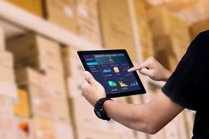 man checking inventory on app