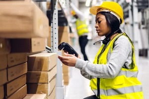 women scanning barcodes of inventory items