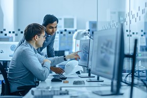 software development engineers discussing features to add into a erp project