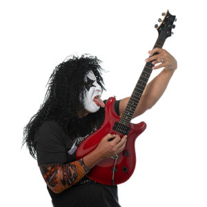 Orases CEO Nick Damoulakis strikes a Gene-Simmons-style pose in full KISS makeup