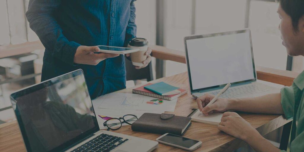 Software developers performing software product enhancements