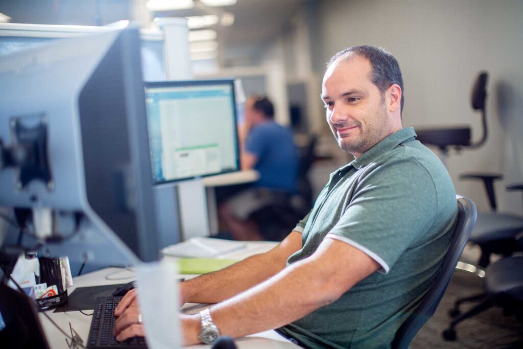 custom software developer working on the stability features of their ehr integration