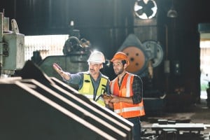 factory maintenance crew observing the condition of their machinery