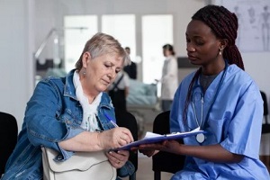 nurse taking sign of patient