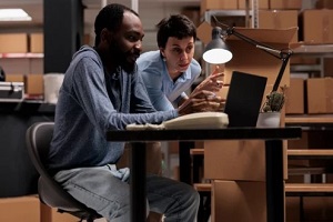 people sitting in warehouse