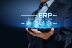 man holding tablet with erp concept