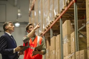 people checking stock in inventory