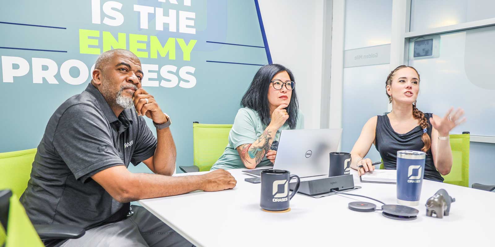 Orases team members discussing financial planning software for advisors