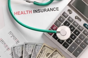 calculator, stethoscope and banknotes on light background