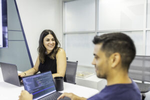 Two team members working together. 