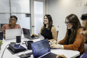 Team members working at a table. 