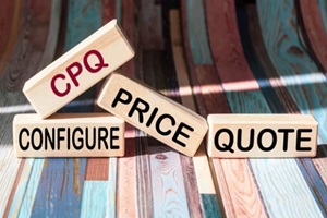on a vintage background, light wooden blocks and cubes with the text CPQ Configure Price Quote