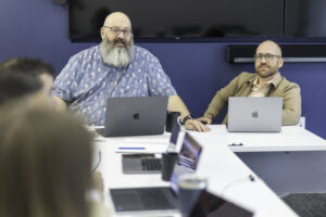 Orases team members in a meeting