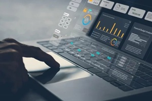 Analyst computer working with information database to analysis marketing sale data
