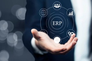 businessman hand holding ERP icon