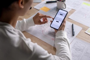 tester testing a mobile app
