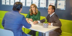 orases president in a meeting about smart financial report generation